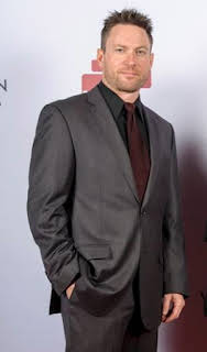 Adam T Perkins