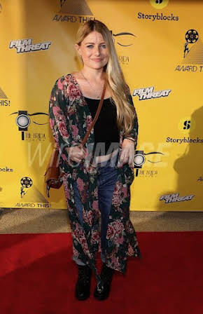 Ashley Eakin as Director