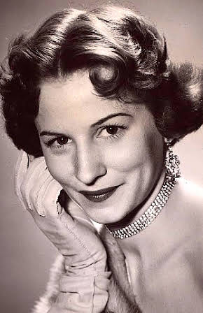 Joan Tompkins as 