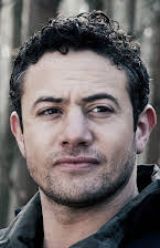 Warren Brown as 