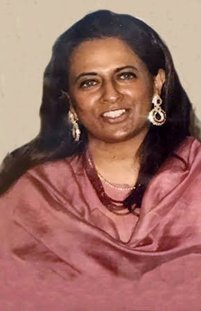 Nisha Sabharwal as Director
