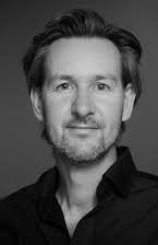 Liam Le Guillou as Director