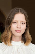 Mia Goth as 