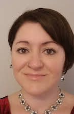 Roisin Clarke as Director