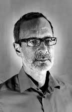 Robert B. Weide as Director