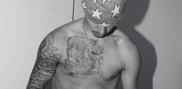 Romeo Beckham Shows Off Growing Tattoo Collection in New Shirtless Photo