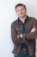 Umut Aral as Director