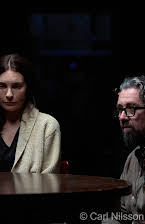 Erik Eger som Director