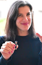 Kacey Arnold as Director