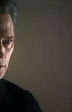 Darren E. Burrows as 