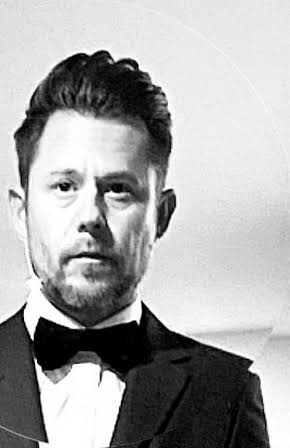 Jonny Cournoyer as Director