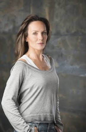 Laura Soltis as 