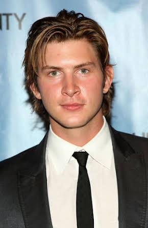 Greyston Holt as 