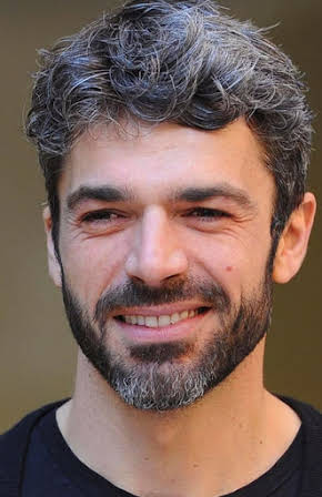 Luca Argentero as 