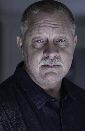 John Lacy as 