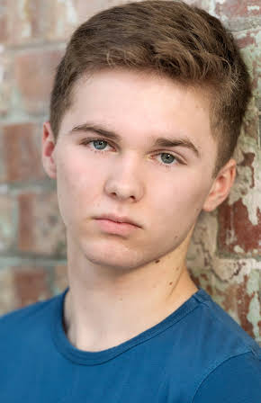 Gus Barry as Martin (aged 12)