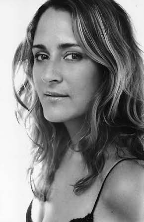 Tina Holmes as Rachel