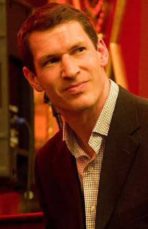 Tim Hetherington as Director
