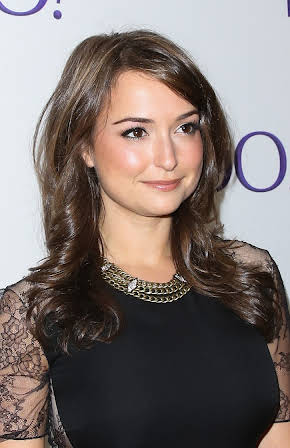 Milana Vayntrub as 
