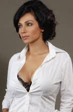 Flora Saini as 