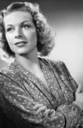 Madeleine Robinson as 