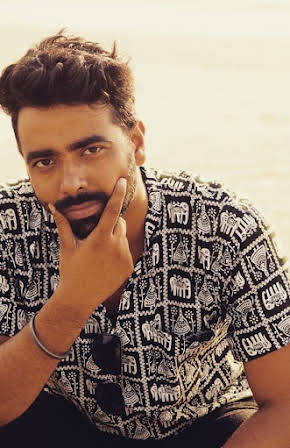 Aman Sidhu as Director