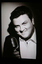 Simon Delaney als Director