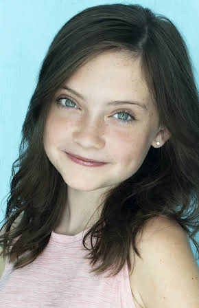 Maya McNair as 