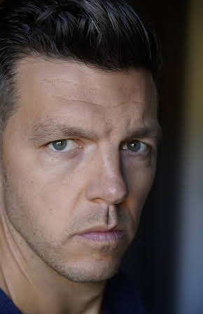 Justin G. Dyck as Director