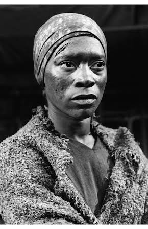 Novella Nelson as Mrs. Tate