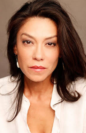 Liz Burnette as 