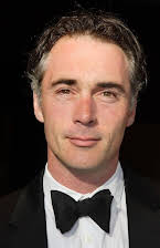 Greg Wise as 