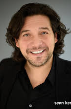 Sean Kenin as Guy in Plaid Shirt