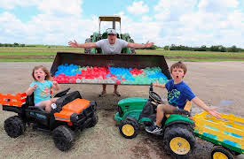 Hudson's Playground: Filling Tractors With Tons of Water Balloons!