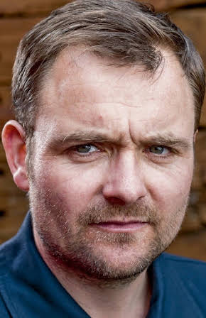 Neil Maskell as 