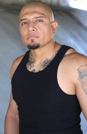 Carlos Ayala as Director