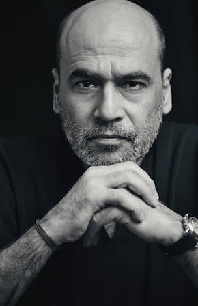Mohan Kapur as 