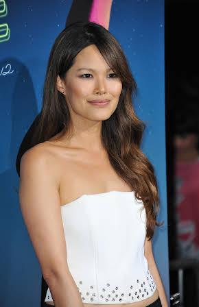 Elaine Tan as 