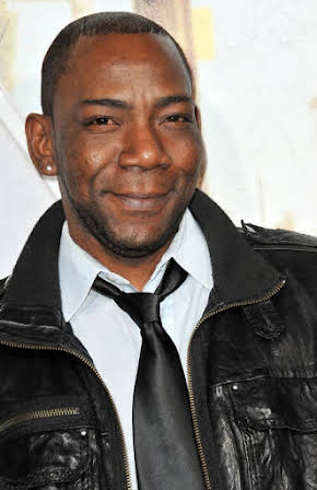 Laurence Mason as 