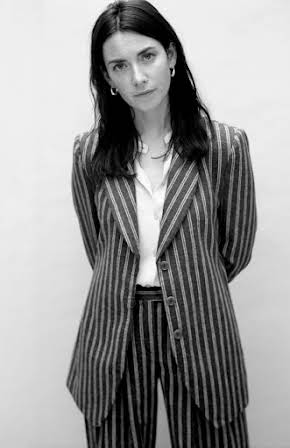 Tamsin Topolski as 