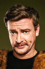 Rhys Darby como 