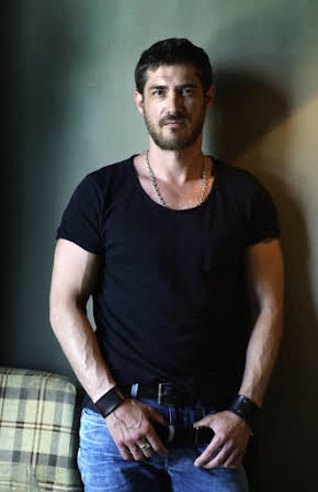 Sergey Strelnikov as 