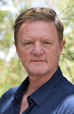 Mark Lamprell as Director