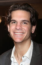 Alex Timbers som Director