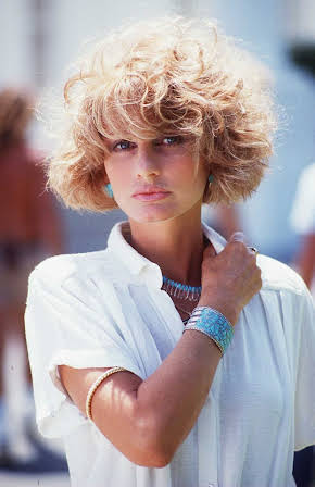 Jill Ireland as 