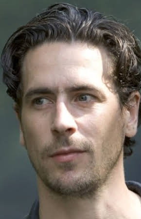Ola Rapace as 