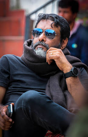 Sarthak Dasgupta as Director