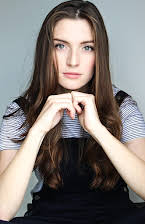 Amy Doyle som Director