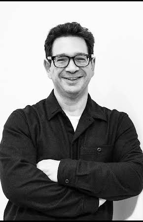 Peter Ettedgui as Director