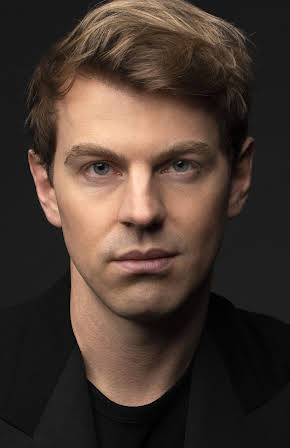Adam Drew as 